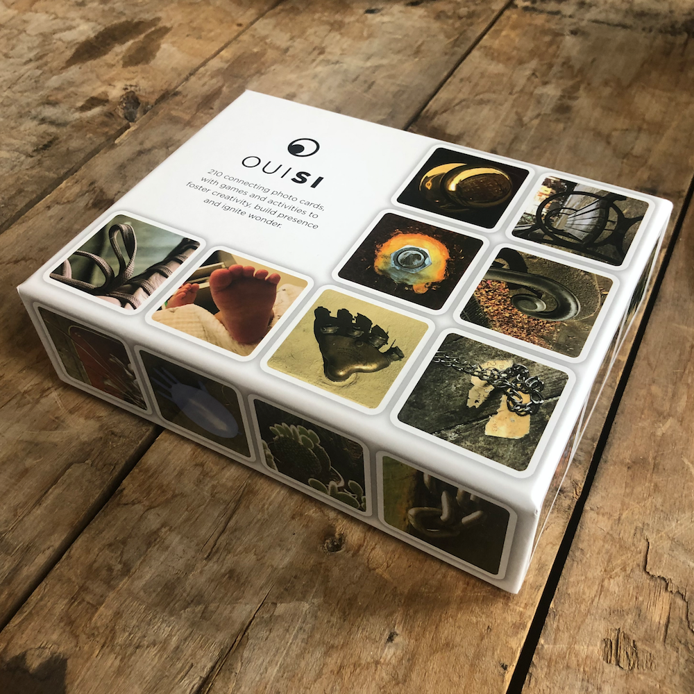 Close up side-angle shot of OuiSi game box