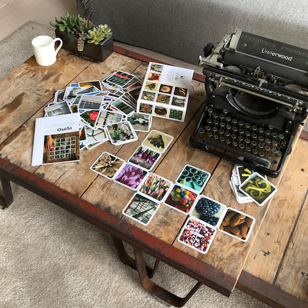 OuiSi spread out on a coffee table